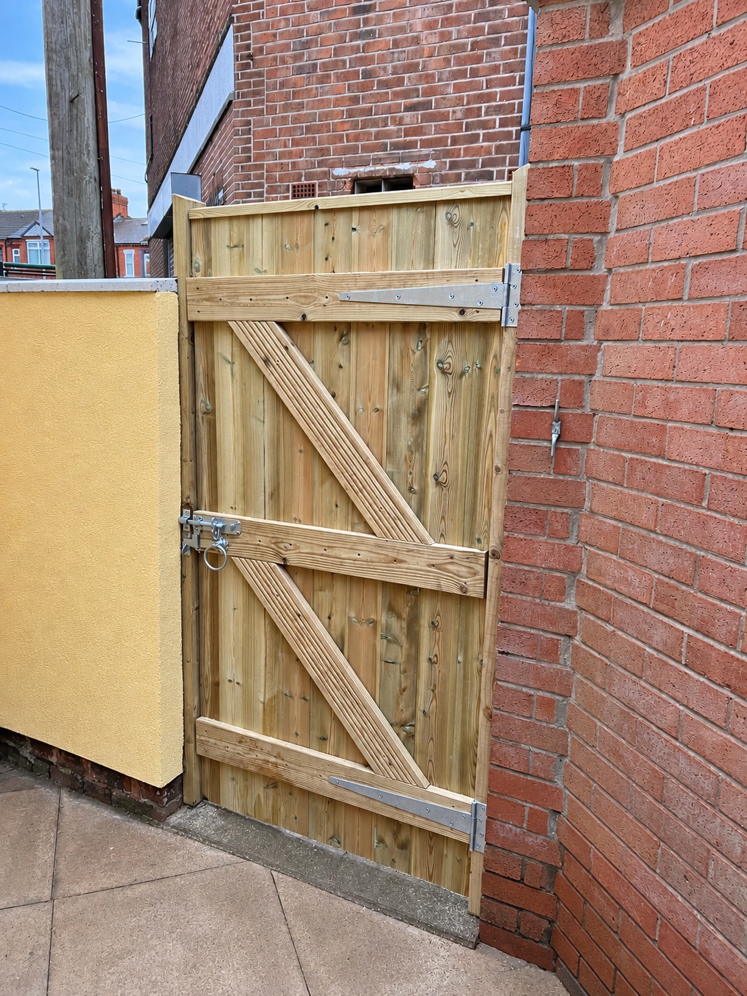 Rear construction view of a heavy ledge and brace timber gate
