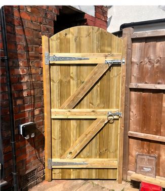 Curved-top timber gate with Gatemate hardware